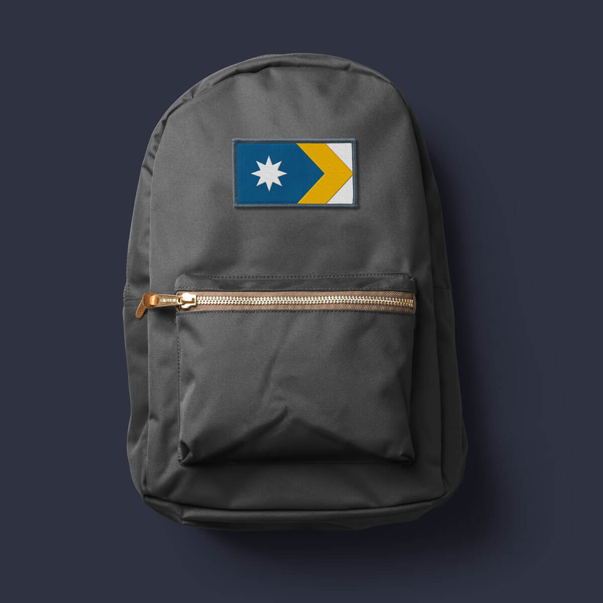 A Unity Flag patch stitched into a backpack, with an Australian passport