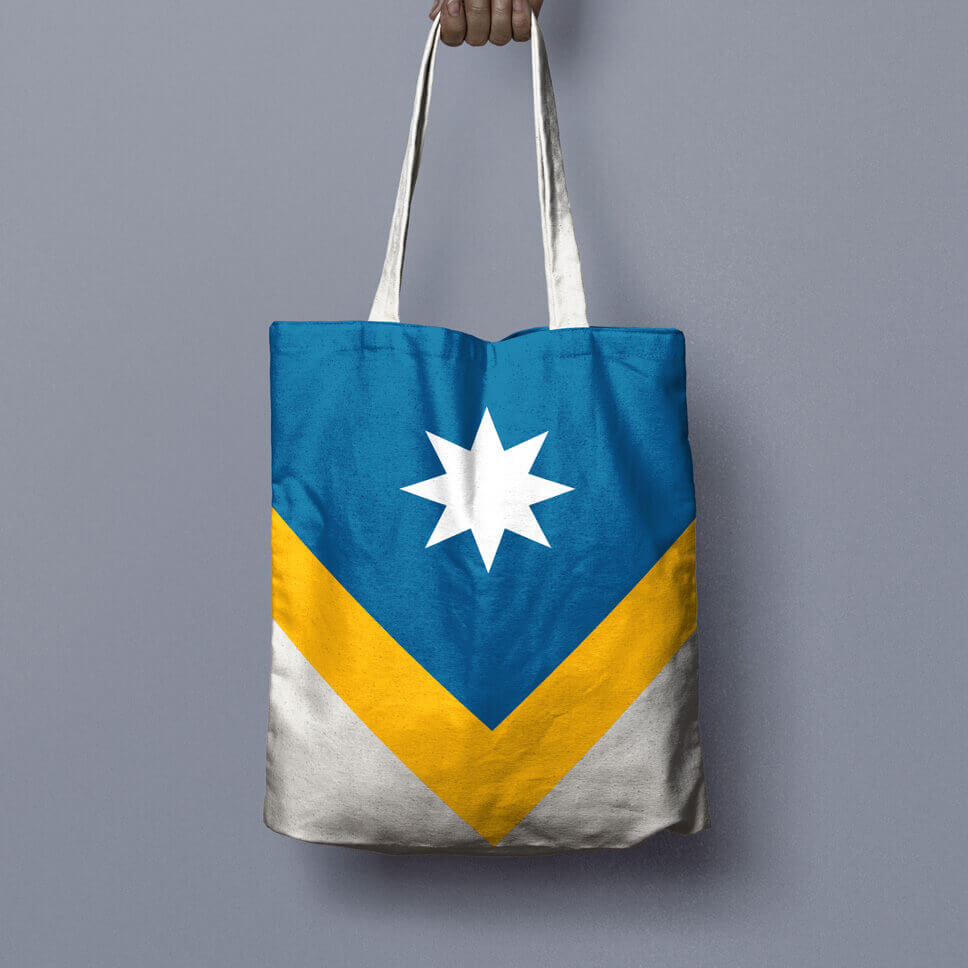 A tote bag printed with the Unity Flag